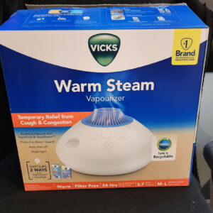 Vicks steamer. Used 1 time. Like new. Bottle of Vicks vapo steam included.