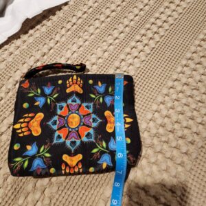 INDIGINOUS design. Hand purse or makeup bag.